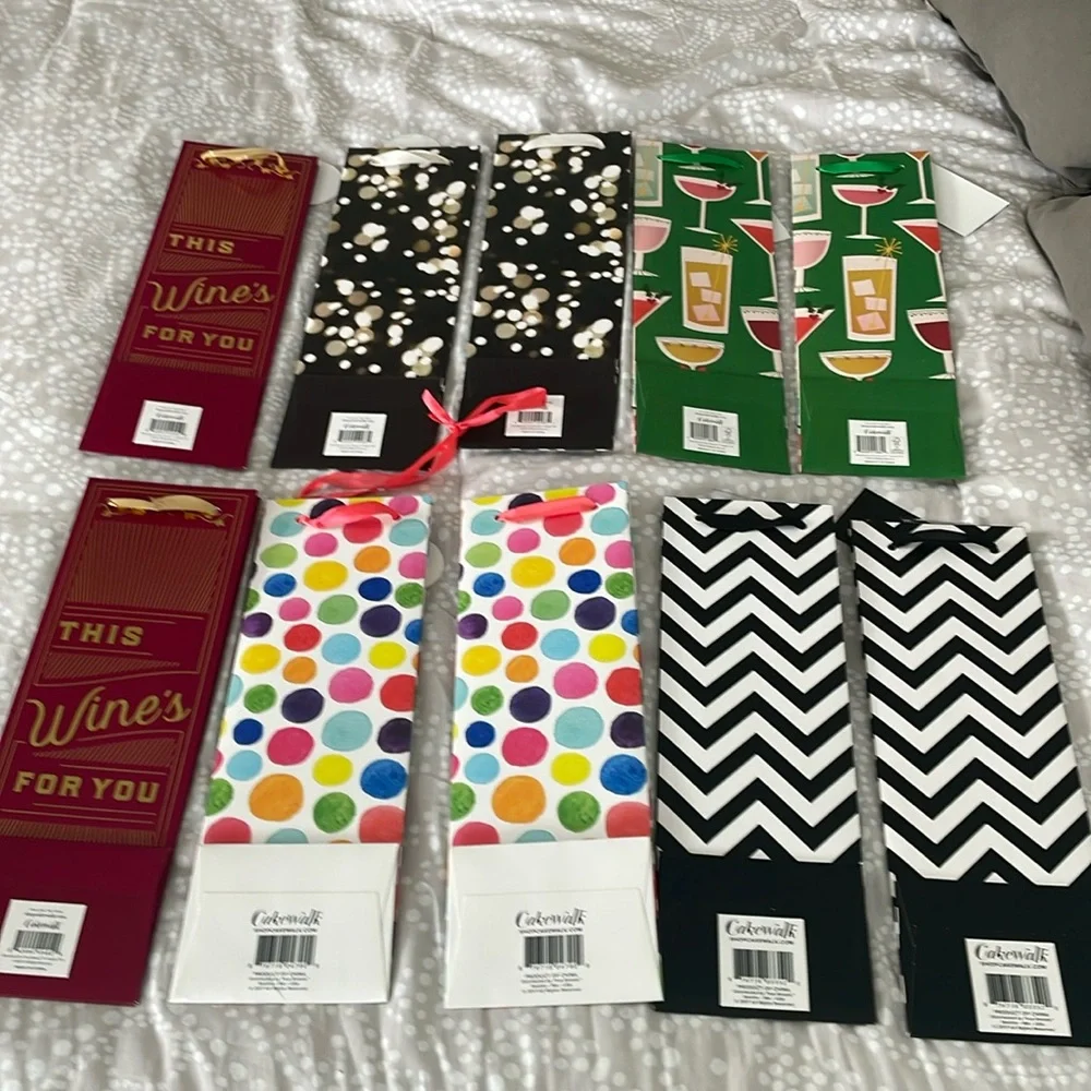 Set of 10 miscellaneous wine gift bags. Great for the upcoming holidays